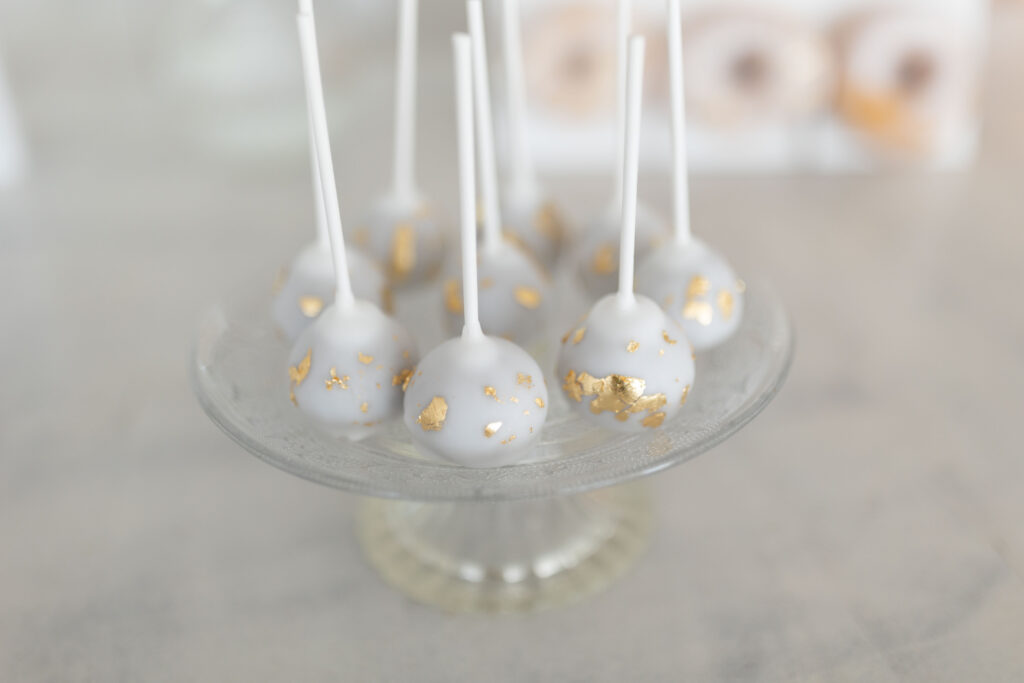 gold detailed cake pops at Bethany and Adam's wedding