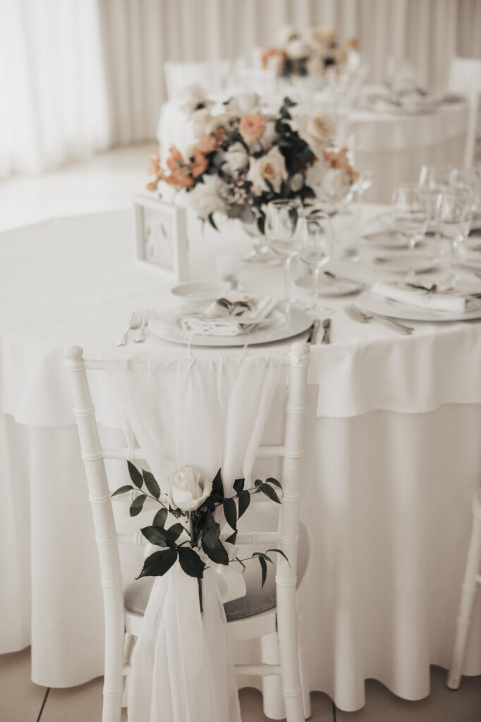 close up of tied chair back at Anneliese and James Santorini wedding