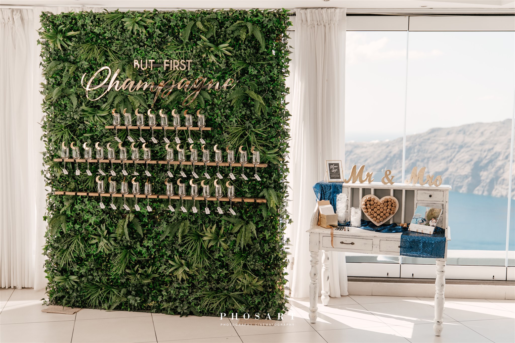 champagne display wall at wedding in Santorini Le Ciel