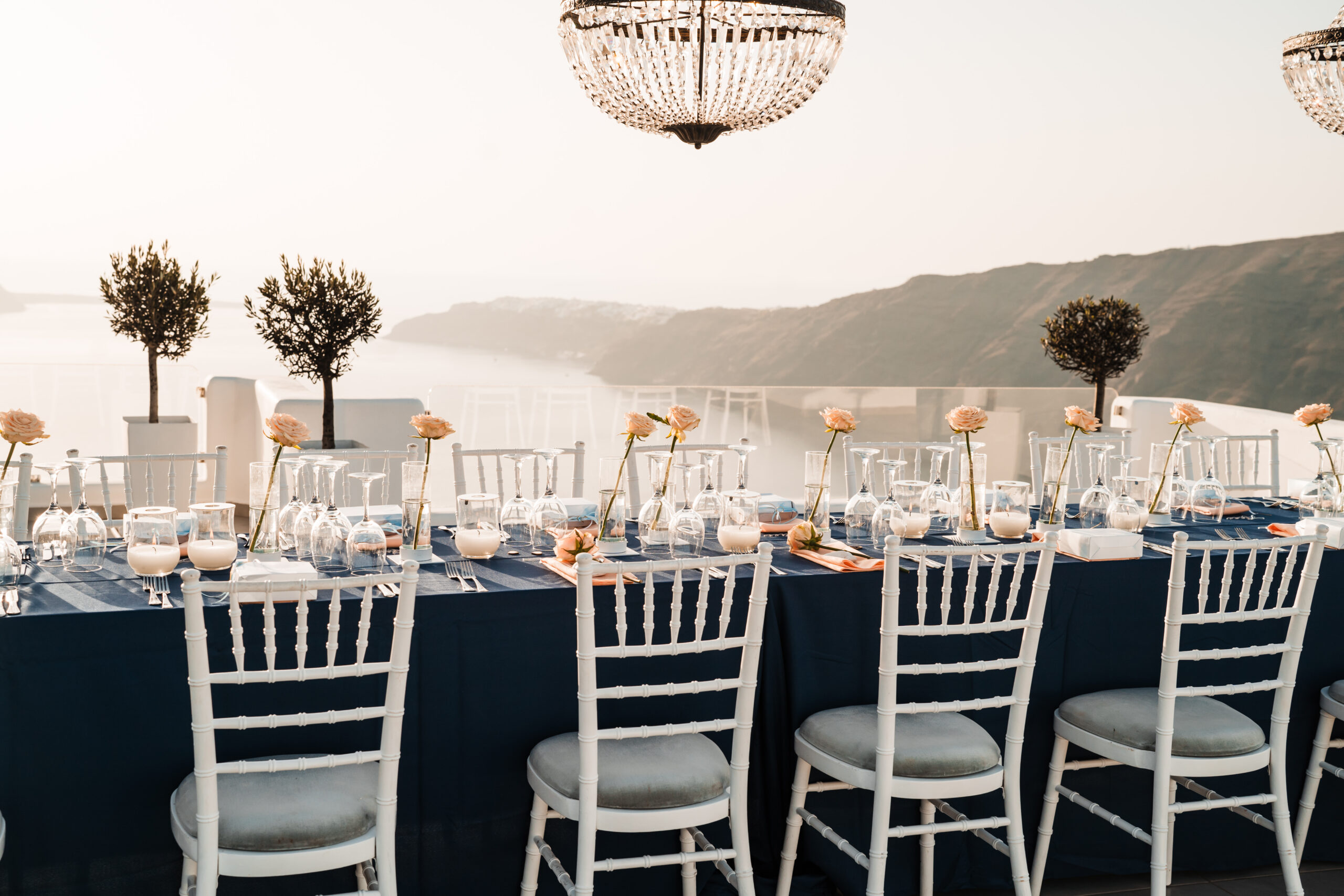 outdoor reception table set up at Le Ciel destination wedding venue in Santorini