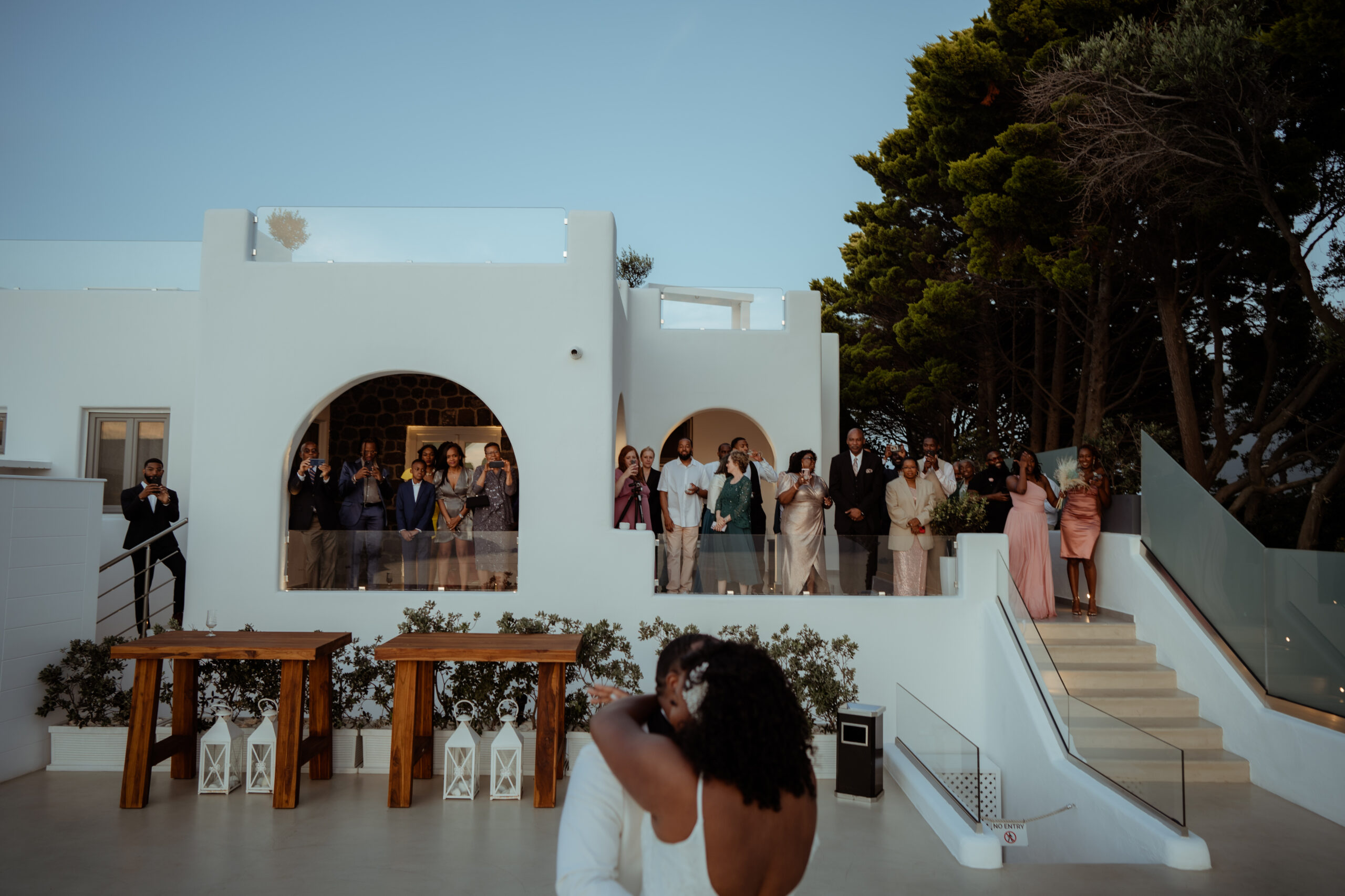 guests watching bride and groom dancing on Le Ciel terrace