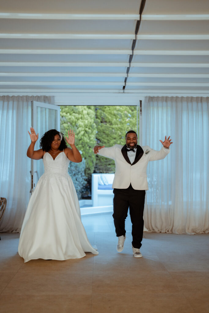 Stephanie and Vincent dancing into their reception at Le Ciel santorini wedding