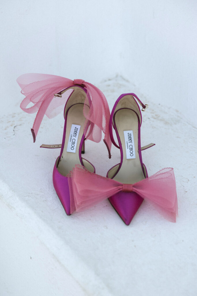 pink Jimmy Choo heels with large bow