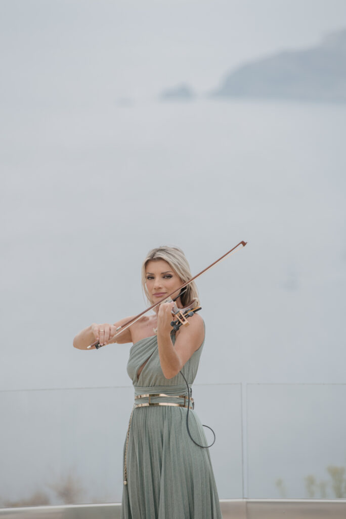 Violinist playing at Le Ciel wedding ceremony