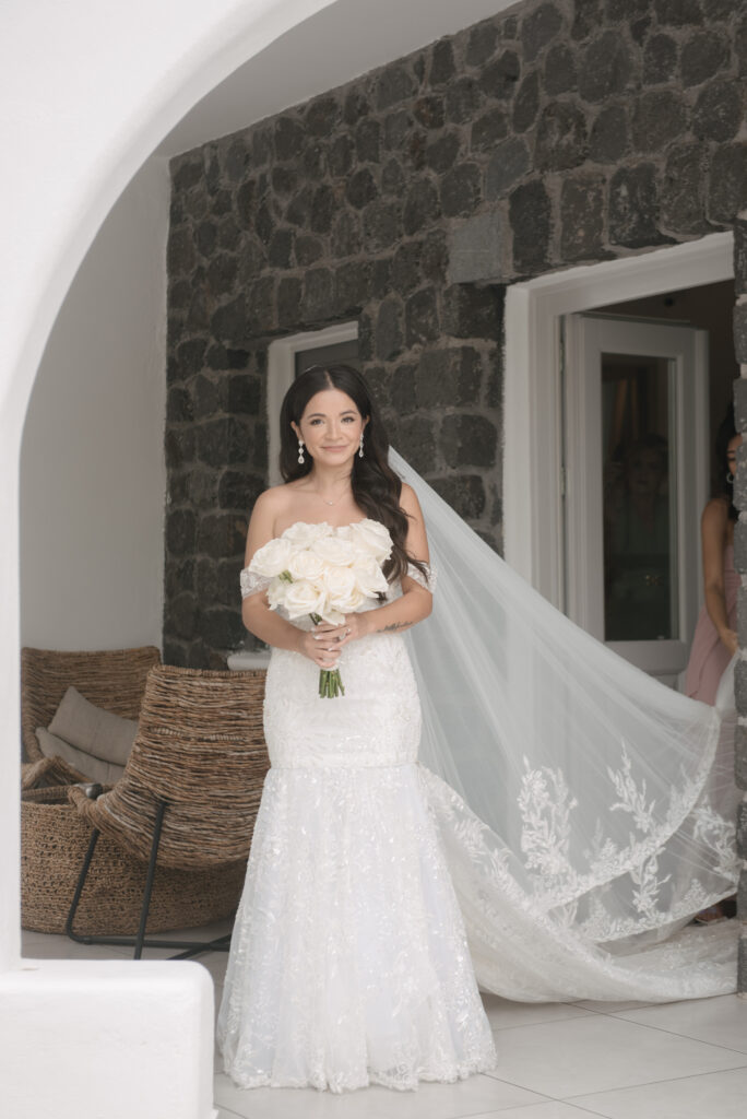 Carol the bride holidng her bouquet