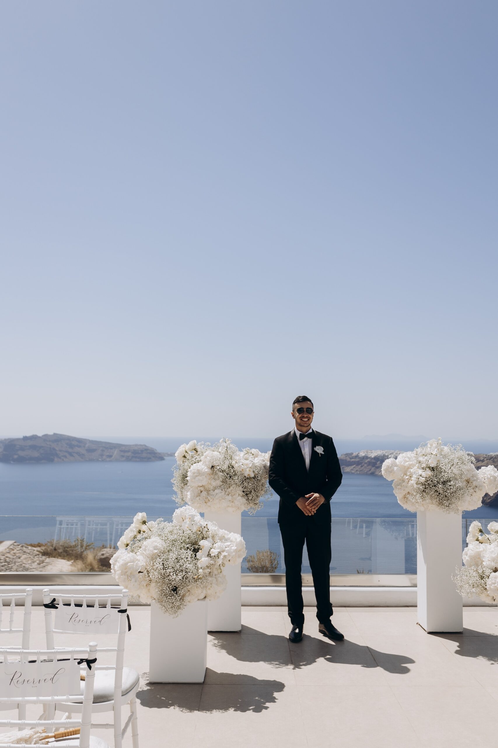 groom standing waiting for le ciel ceremony