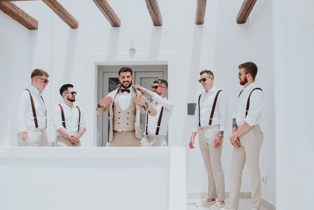 groom and groomsmen getting ready at Le Ciel Santorini wedding venue